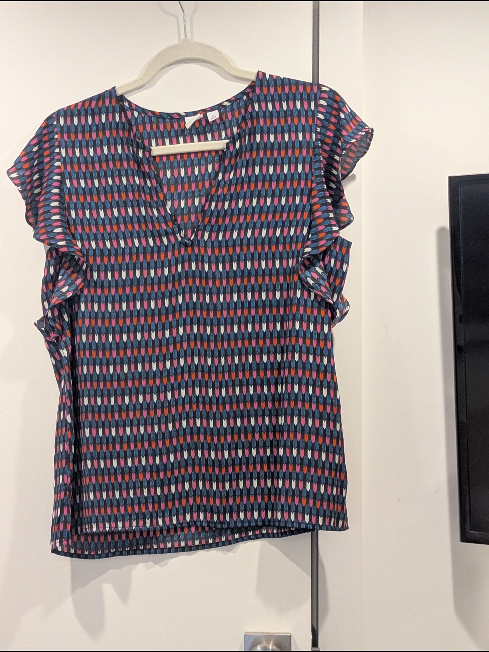 GAP Navy V‑Neck Flutter Sleeve Top with Pink & Teal Motif